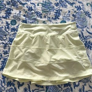Light yellow tennis skirt from Lululemon. Size 4.